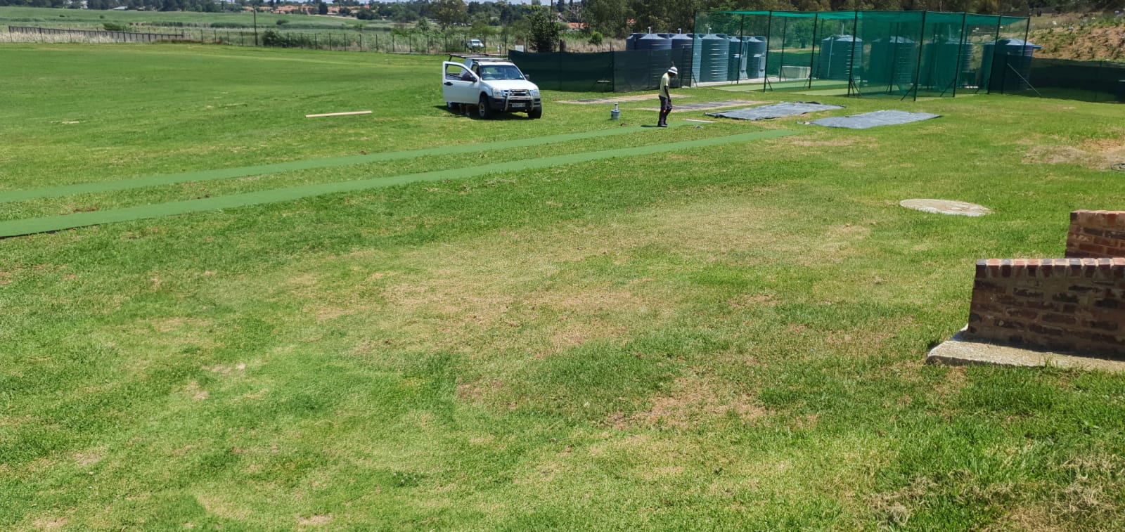 Artificial grass long jump run up installation